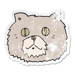 distressed sticker of a cartoon cat face