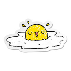 distressed sticker of a cartoon fried egg