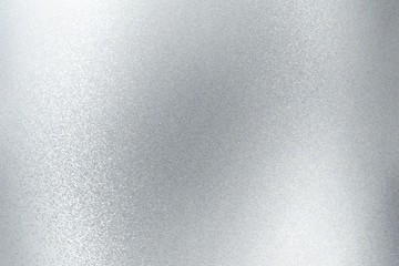 Shiny brushed silver metallic panel, abstract texture background