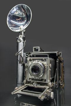 The old universal camera for professional photography on roll film or sheet films. Retro camera, 1940s and 1950s.