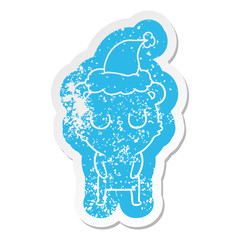 peaceful cartoon distressed sticker of a bear wearing santa hat