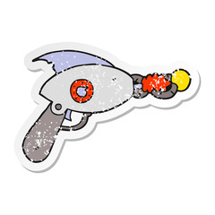 distressed sticker of a cartoon ray gun