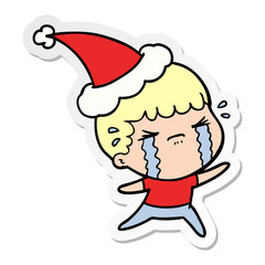 sticker cartoon of a man crying wearing santa hat