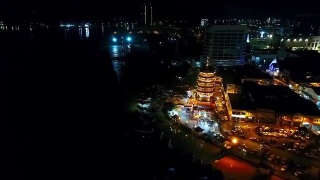 Night Aerial View of a Chinese Template in the city of Kota Kinabalu - Malaysia - Aerial - Backward Dolly 