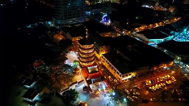 Night Aerial View of a Chinese Template in the city of Kota Kinabalu - Malaysia - Aerial - Front Dolly 