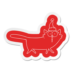 cartoon  sticker of a cat wearing santa hat