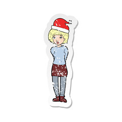retro distressed sticker of a cartoon woman wearing christmas hat