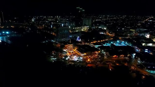 Night View of the city of Kota Kinabalu - Malaysia - Aerial - Backward Dolly 