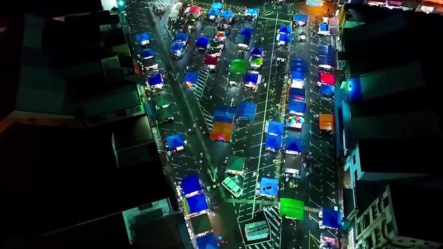Top Night Aerial View of a night Market in the city of Kota Kinabalu - Malaysia - Forward Dolly 