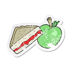 retro distressed sticker of a cartoon packed lunch