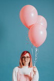 Pink girl with balloons