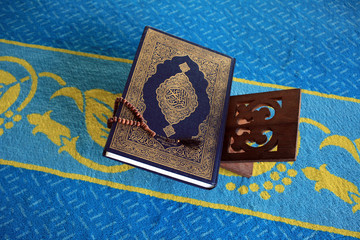 The holy Quran on mosque background