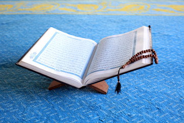 The holy Quran on mosque background