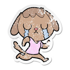 distressed sticker of a cute cartoon dog crying