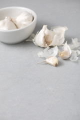 Garlic Bulbs with Garlic Clove on Gray Counter