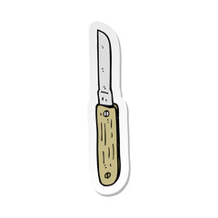 sticker of a cartoon folding knife