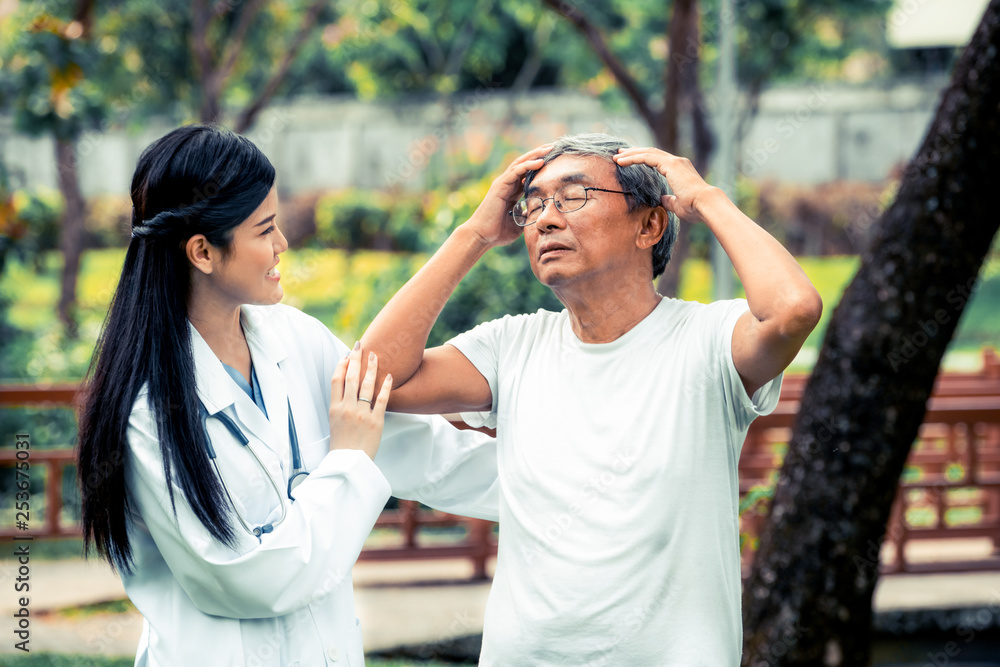 Sticker Friendly doctor taking care of senior man in the hospital garden. Medical and healthcare doctor service concept.