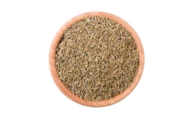 anise seeds in wooden bowl isolated on white background. Spices and food ingredients.