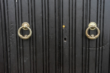 Italy, Varenna, Lake Como, a close up of a door with a knob
