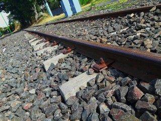 Train tracks and rocks. Railway line at Costa Rica. Background.