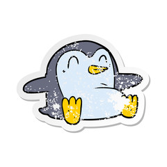 distressed sticker of a cartoon penguin