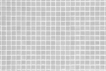 White or gray ceramic wall and floor tiles abstract background.