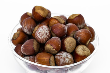 Hazelnuts in a glass bowl