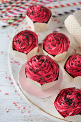 Chocolate cupcakes with pink icing