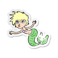retro distressed sticker of a cartoon mermaid