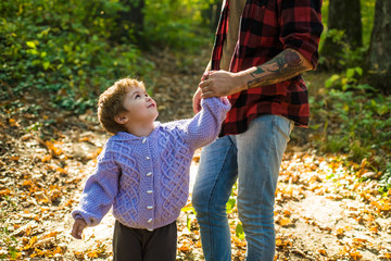 Happy kids autumn. We like autumn time together. Parent teach baby. Happy family, father and baby...