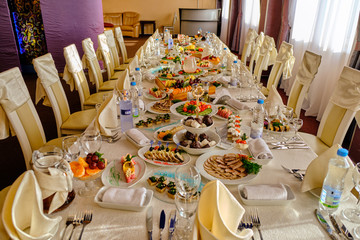festive food on the table. A collage of different food in a restaurant. The concept of healthy eating and diet