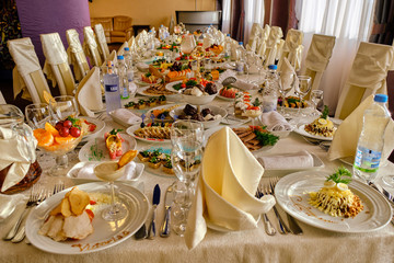 festive food on the table. A collage of different food in a restaurant. The concept of healthy eating and diet