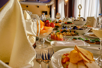 festive food on the table. A collage of different food in a restaurant. The concept of healthy eating and diet