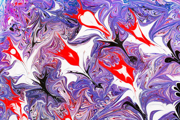Abstract beautiful drawing of Ebru .Turkish style of painting Ebru on water with acrylic paints swirls waves.A stylish combination of natural luxury