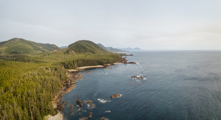 Beautiful aerial seascape view on the Pacific Ocean Coast during a vibrant summer day. Taken in Northern Vancouver Island, British Columbia, Canada.
