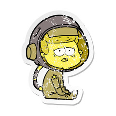 distressed sticker of a cartoon tired astronaut