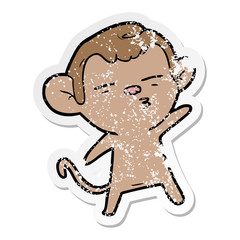 distressed sticker of a cartoon suspicious monkey