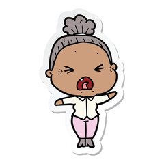 sticker of a cartoon angry old woman