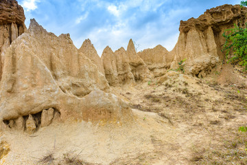 landscape of soil textures eroded sandstone pillars, columns and cliffs, "Sao Din Na Noi" at sri nan national park in Nan Province, Thailand