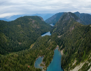 Aerial view of Brunswick Lake and Hanover Lake surrounded by the beautiful Canadian Mountains. Taken near Squamish, North of Vancouver, BC, Canada.
