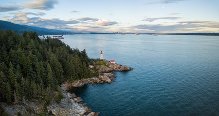 Fototapeta na wymiar Aerial view of a beautiful Canadian Landscape during a cloudy summer sunset. Taken in Lighthouse Park, Horseshoe Bay, North Vancouver, BC, Canada.