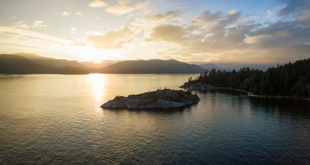 Aerial view of a beautiful Canadian Landscape during a cloudy summer sunset. Taken in Whytecliff Park, Horseshoe Bay, North Vancouver, BC, Canada.