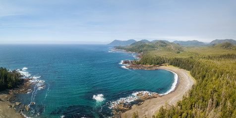 Fototapeta na wymiar Beautiful aerial seascape view on the Pacific Ocean Coast during a vibrant summer day. Taken in Northern Vancouver Island, British Columbia, Canada.