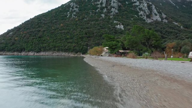 Beautiful view of Divna beach. Cres Island. Croatia. Aerial view traveling. Low flying