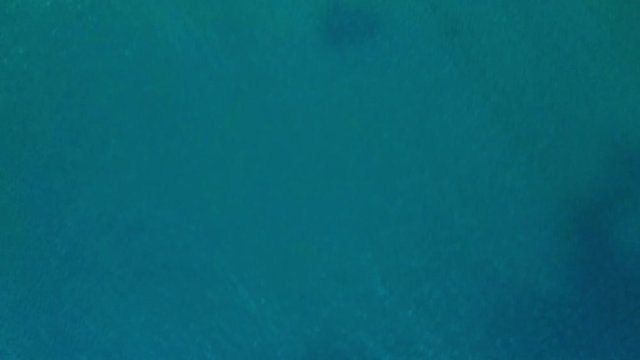 Beautiful landscape of the clear and colorful waters and the sand of the beach of Divna on a sunny day. Cres Island. Croatia. Aerial view traveling. Birds eye