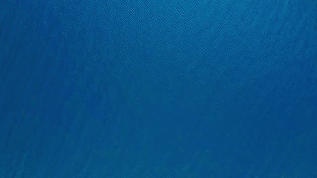 Beautiful view of the blue waters of the Adriatic Sea at Divna beach. Cres Island. Croatia. Aerial view. Birds eye