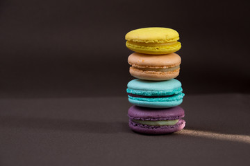 Stacked colourful macarons.