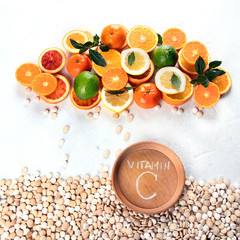 Colorful of citrus fruits and vitamin pills