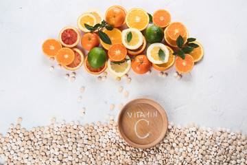 Colorful of citrus fruits and vitamin pills