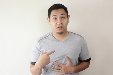 Asian Man Pointing Himself with Unhappy Expression